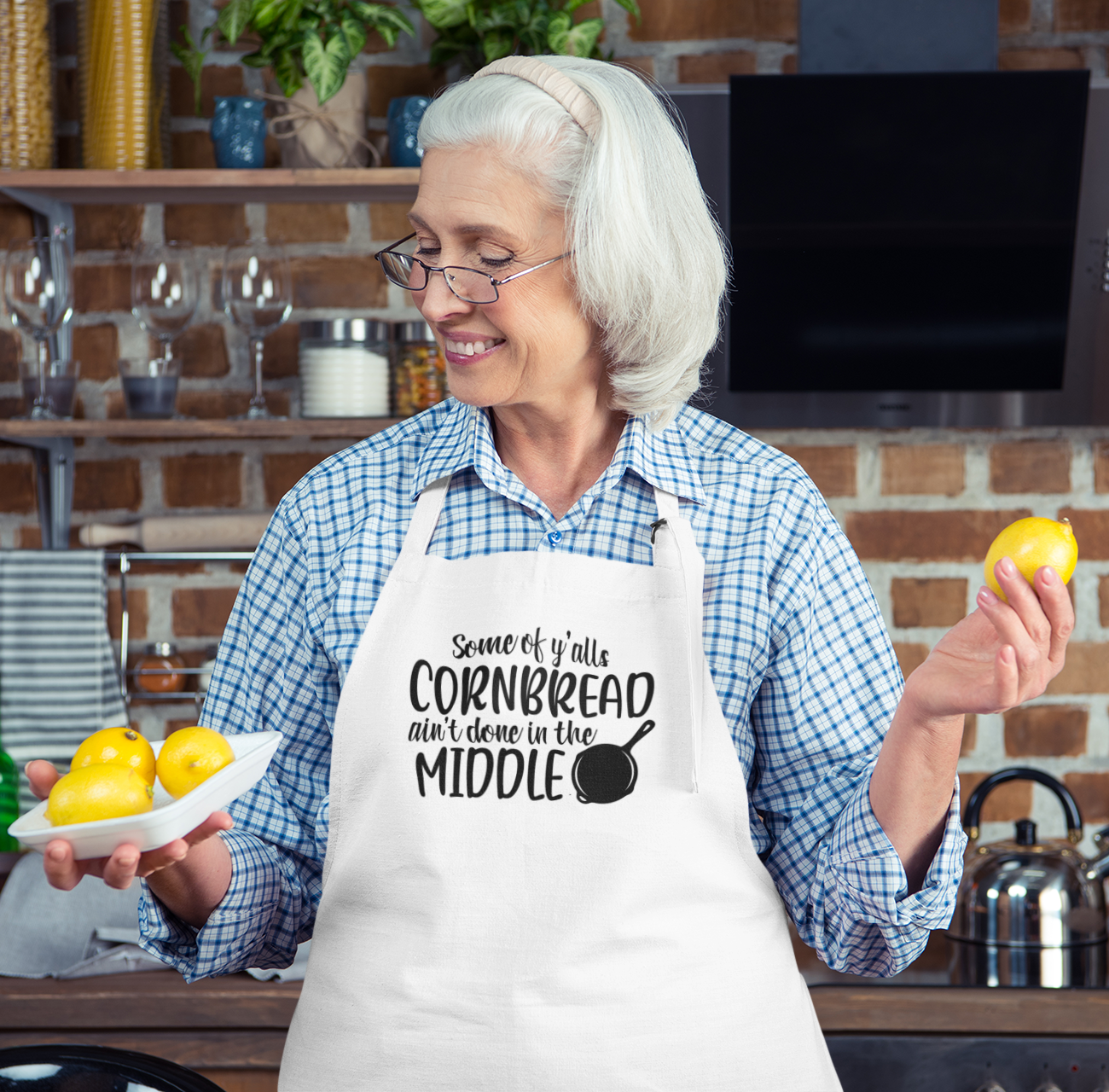 apron-mockup-featuring-a-happy-senior-woman-holding-a-lemon-m14665-r-el2